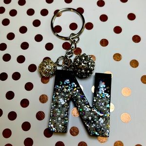 Black and sliver keychain letter N